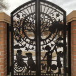 custom steel gate with children and tree